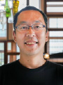 本山 喜之 氏